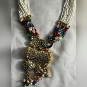 Big long multi color necklace with earrings and head piece